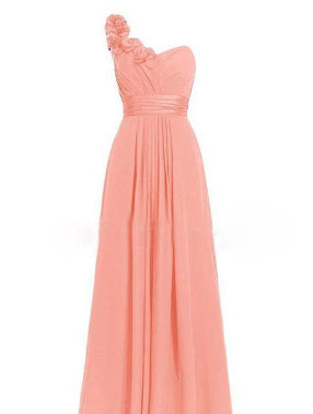 Peach-colored one-shoulder dress with floral detail on a white background
