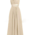 Beige one-shoulder dress with floral details on a white background