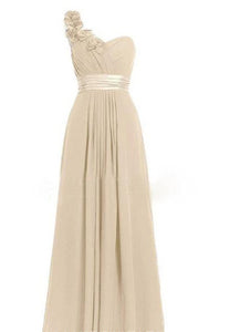 Beige one-shoulder dress with floral details on a white background