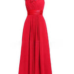 Red evening gown with floral detail on a white background